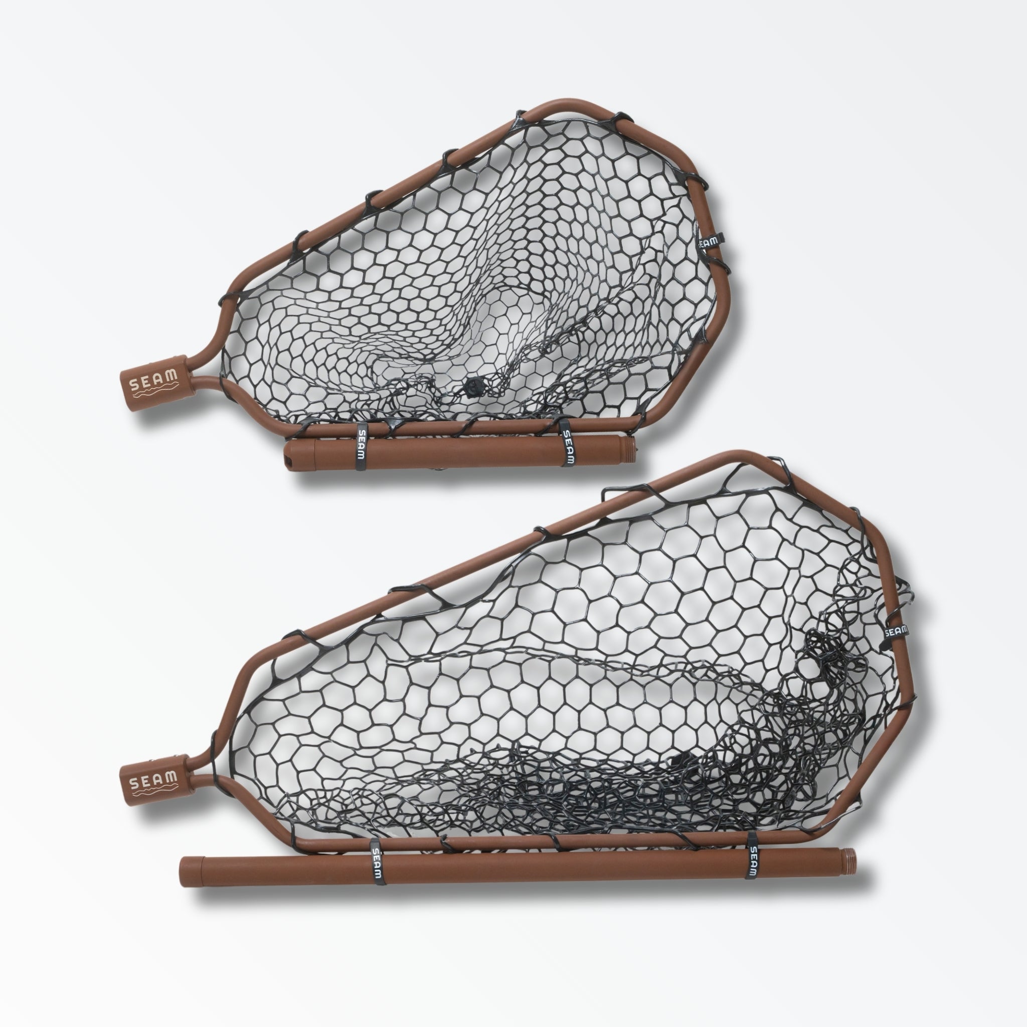 Two different sized brown landing nets for fly fishing