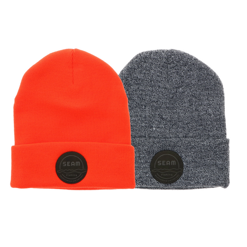 Two beanies, one orange and one gray, with a Seam logo on a white background (global).