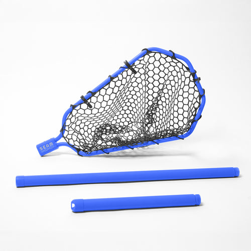 Blue fishing net with two blue handles on a white background